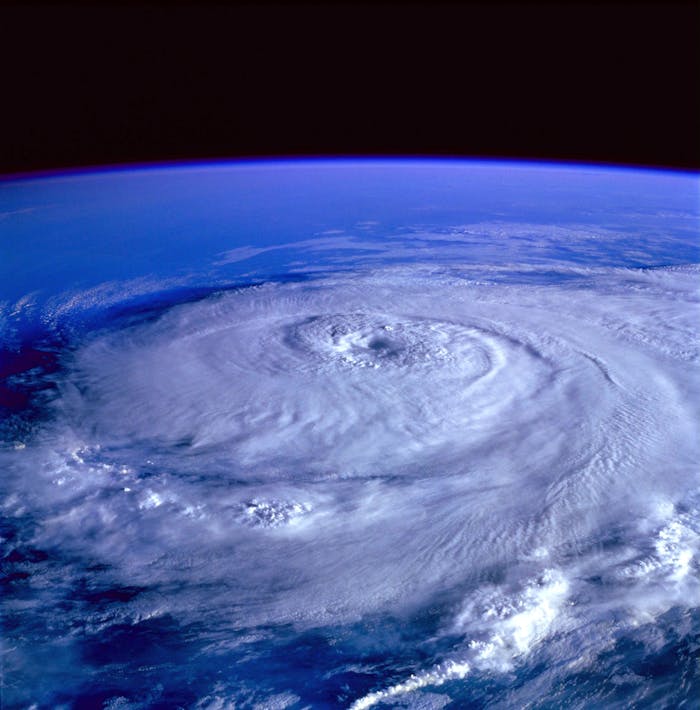 hurricane-earth-satellite-tracking-71116 A breathtaking satellite image capturing a swirling hurricane over the Earth's ocean.